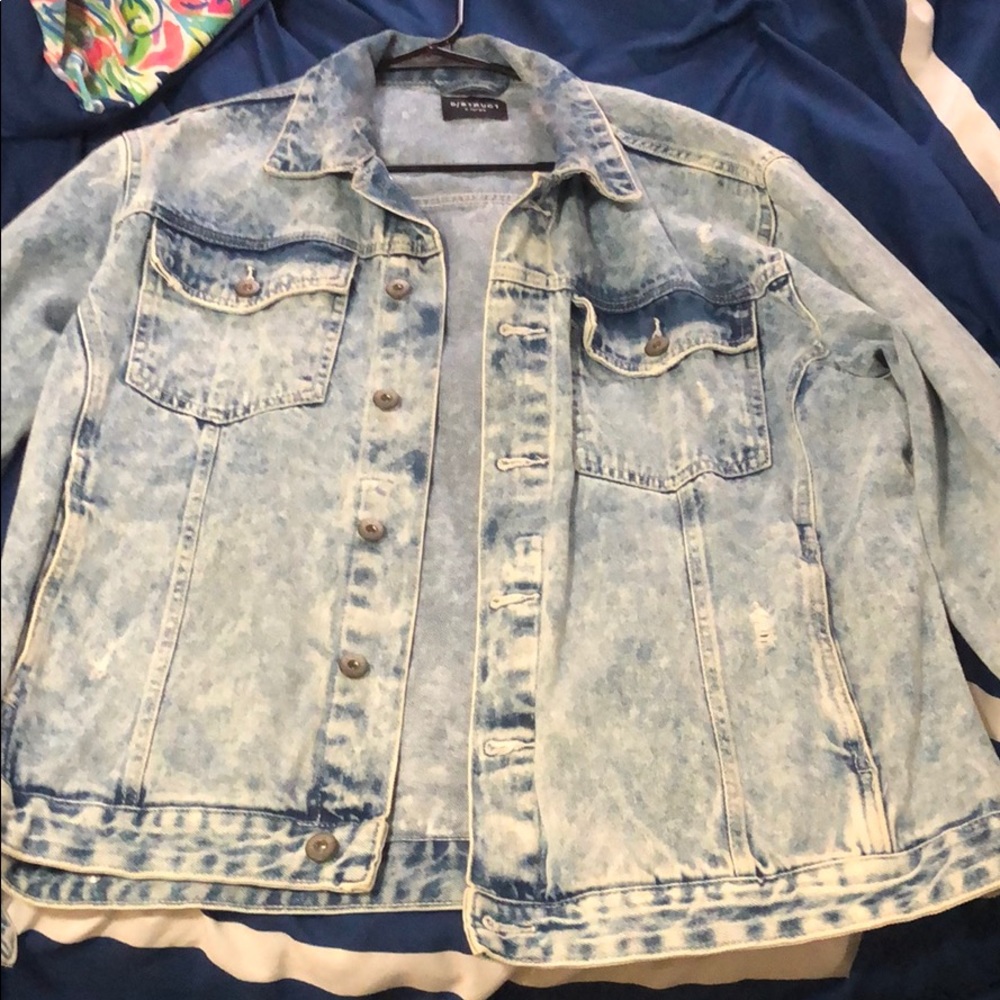 Distressed jean jacket